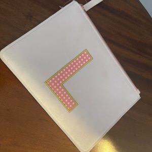 Cosmetic purse with L logo